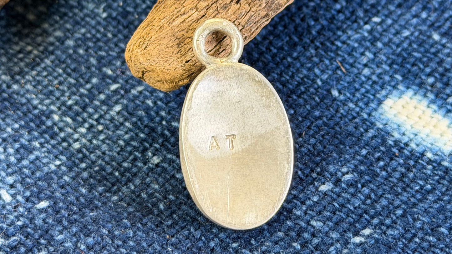 Carved Rutilated Quartz Pendant by Andrew Thornton