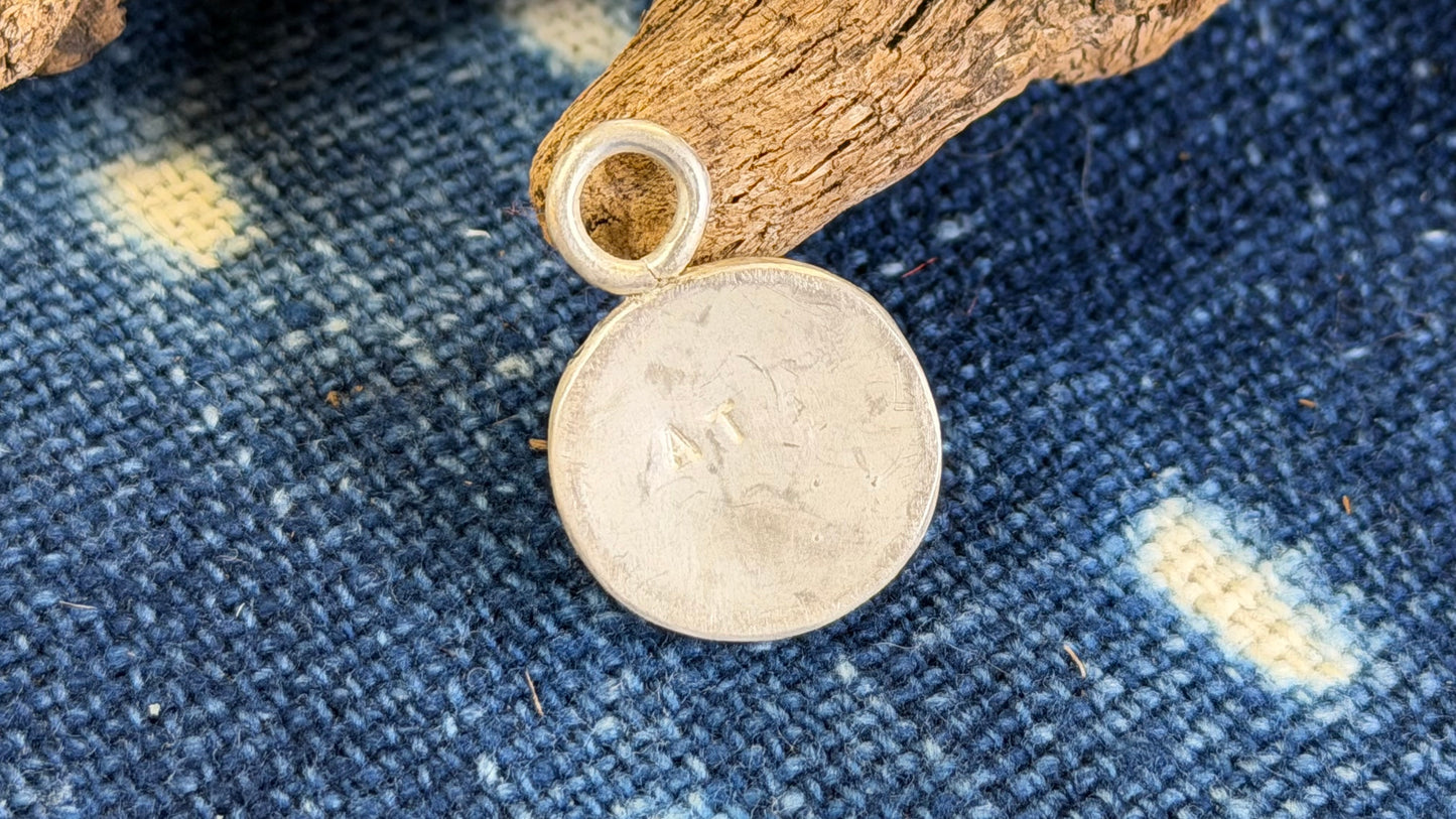 Carved Rutilated Quartz Pendant by Andrew Thornton