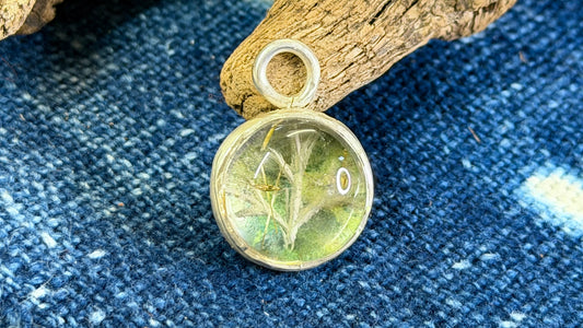 Carved Rutilated Quartz Pendant by Andrew Thornton