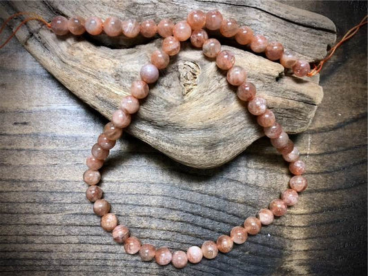 AAA Fire Sunstone Smooth Rounds Bead Strand - 7mm - 15.5"