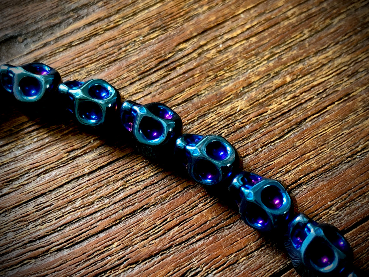 Hematite Electroplated Skulls Strand - 10mm x 8mm - 8"