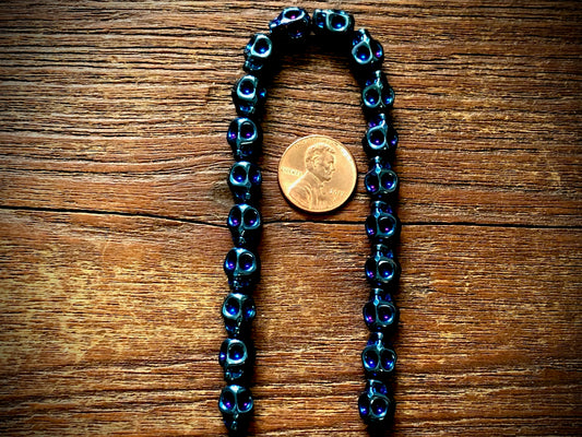 Hematite Electroplated Skulls Strand - 10mm x 8mm - 8"