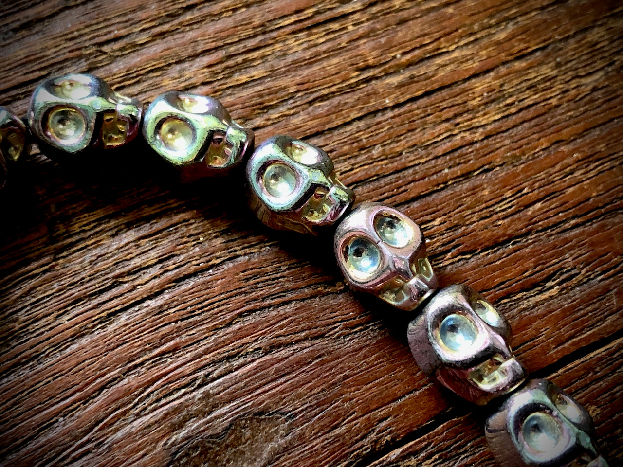 Hematite Electroplated Skulls Strand - 10mm x 8mm - 8"