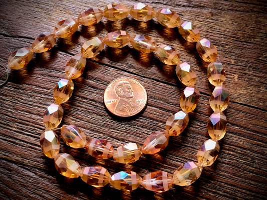 Crystal Orbits Faceted Rice Beads Strand - Peach AB - 12mm x 8mm