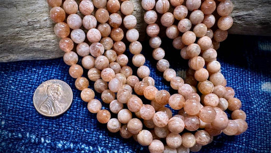Fire Sunstone Bead Strand - AAA Grade - Smooth Rounds - 6mm - 15.5"