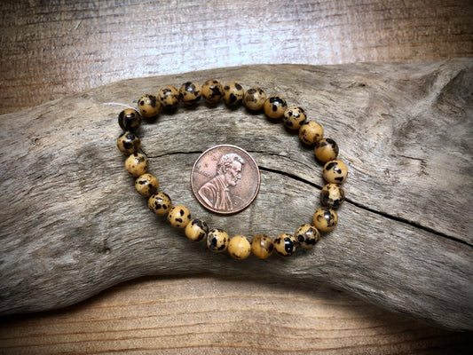 Druk Czech Glass - Brown Speckled Rounds - 6mm