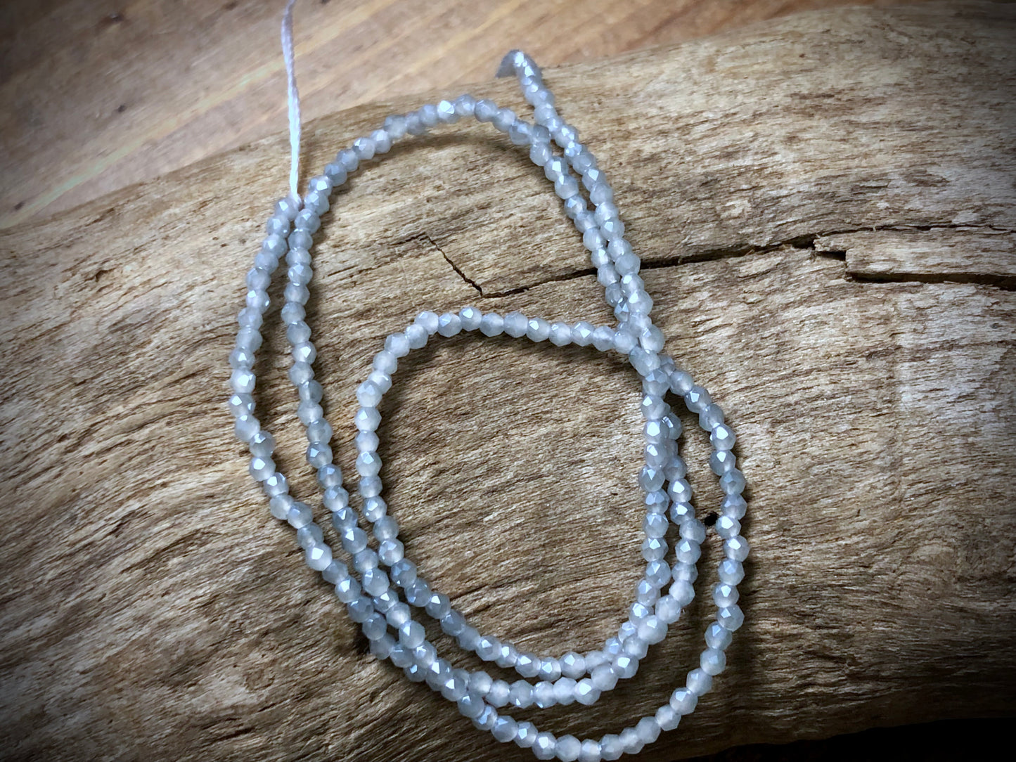 Thunder Polish Glass Faceted Rounds Strand - Light Grey-Blue - 2mm - 14”