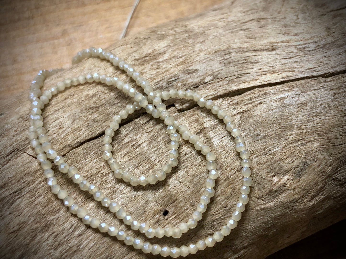 Thunder Polish Glass Faceted Rounds Strand - Cream - 2mm - 14”