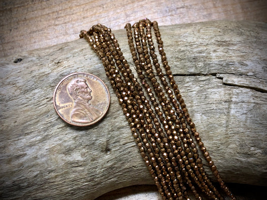 Thunder Polish Glass Faceted Rounds Strand - Copper - 2mm - 14”