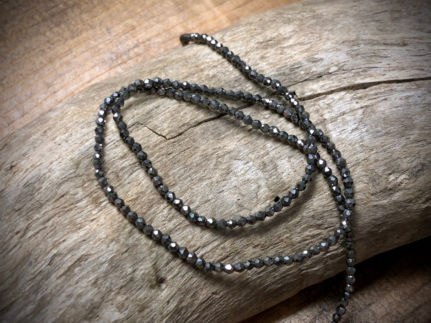 Thunder Polish Glass Faceted Rounds Strand - Hematite - 2mm - 14”