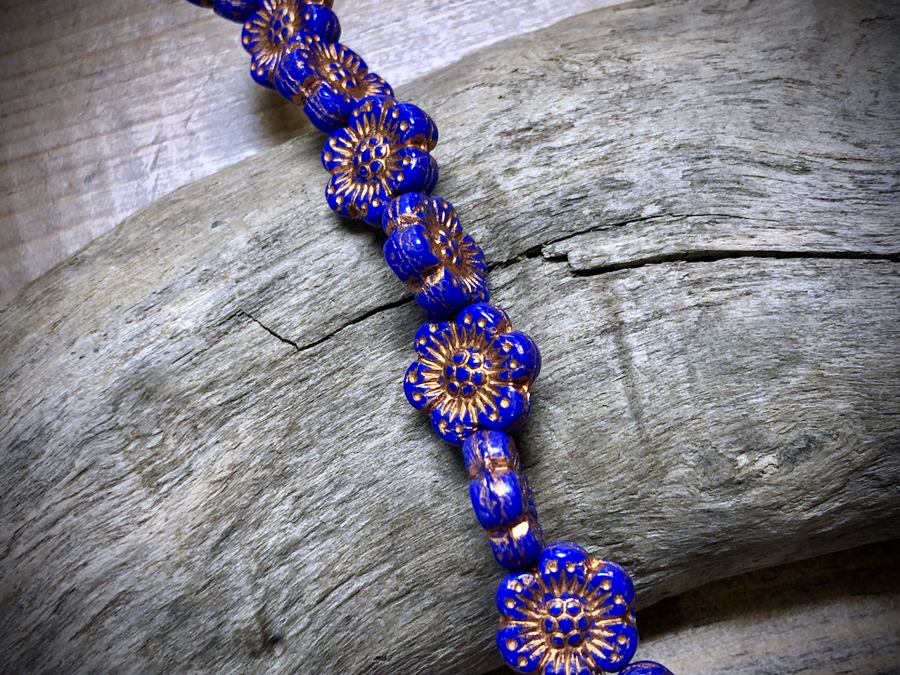 Opaque Royal Blue Wild Rose with Bronze Wash Pressed Czech Glass Beads