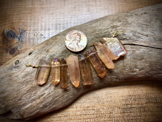 Graduated AB Bronze Coated Quartz Sticks - 27mm x 9mm to 19mm x 9mm - 2.5" Strand