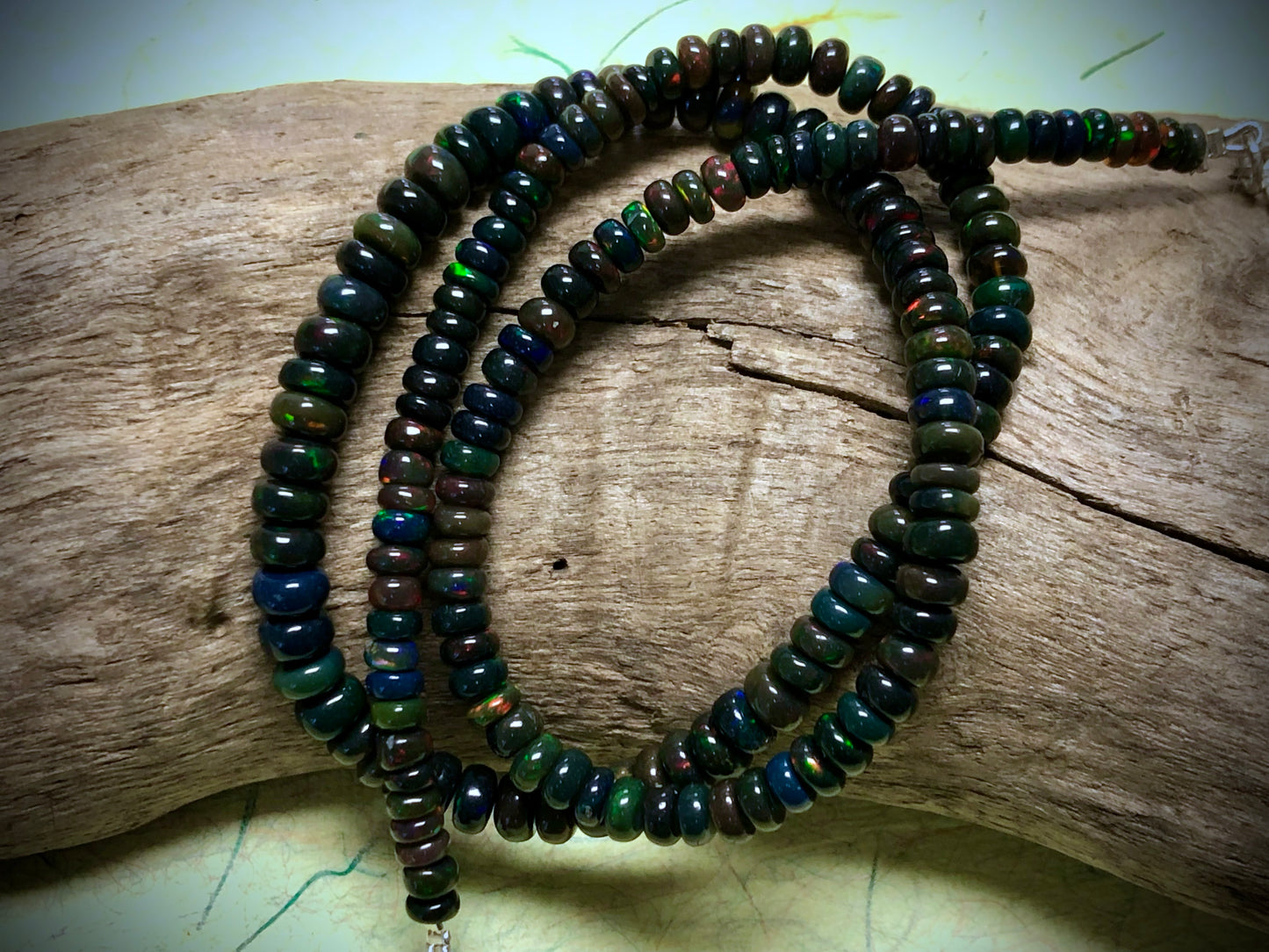 Black Opal Graduated Smooth Rondelles Strand/Necklace - 18"