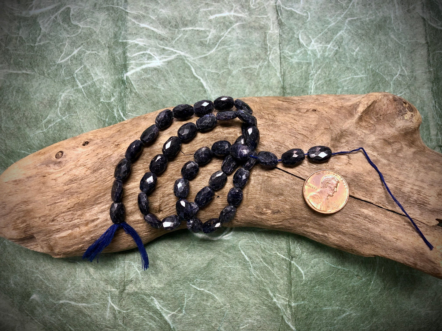 Sapphire Faceted Ovals - 10mm x 7mm - 16”