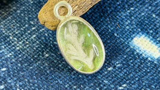 Carved Rutilated Quartz Pendant by Andrew Thornton