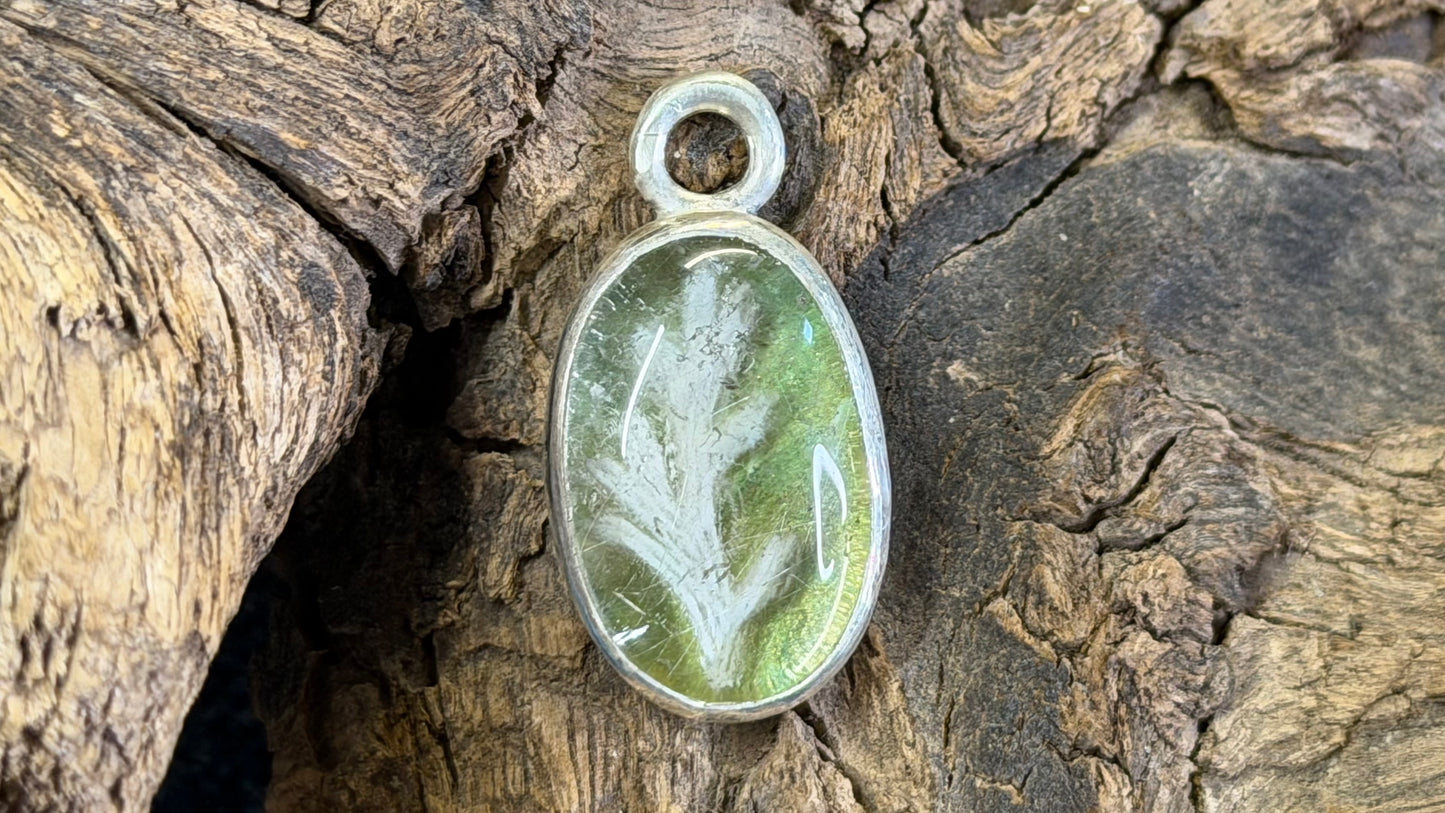 Carved Rutilated Quartz Pendant by Andrew Thornton
