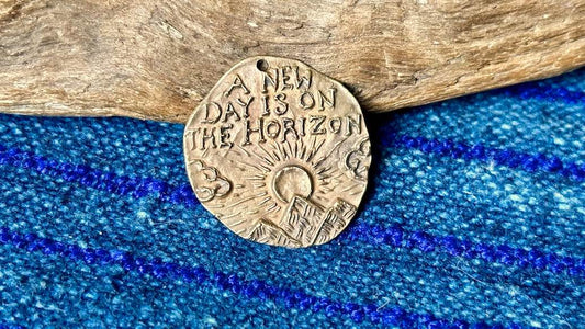 Bronze Pendant by Andrew Thornton - A New Day is On the Horizon