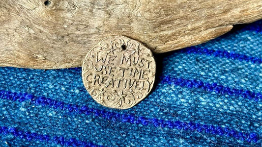 Bronze Pendant by Andrew Thornton - We Must Use Time Creatively