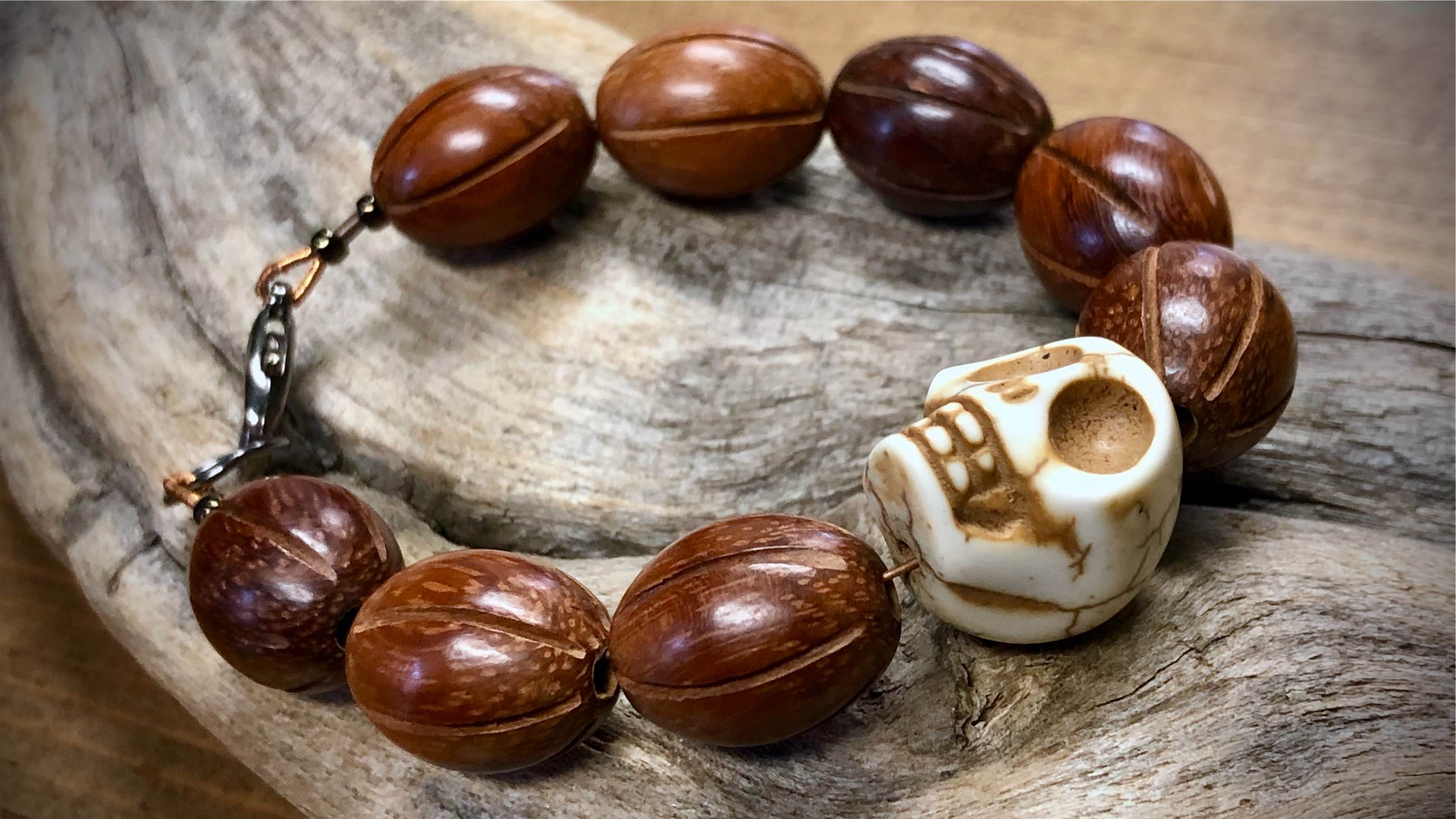 Hand-carved wooden skull bead bracelet : r/skulls