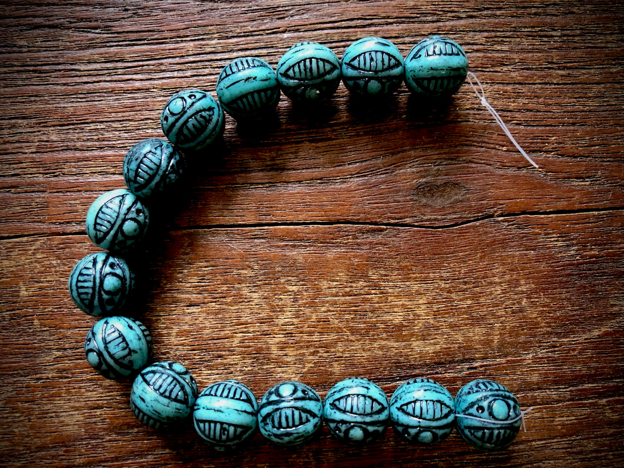 Czech Glass Strand—Turquoise/Jet Polynesian Patterned Round Beads