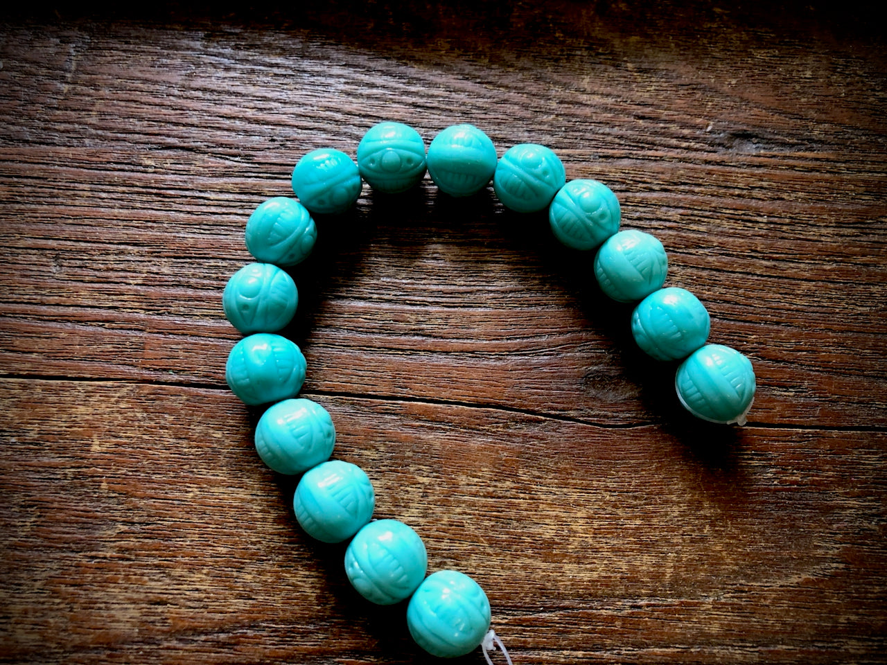 Czech Glass Strand—Turquoise Polynesian Patterned Round Beads