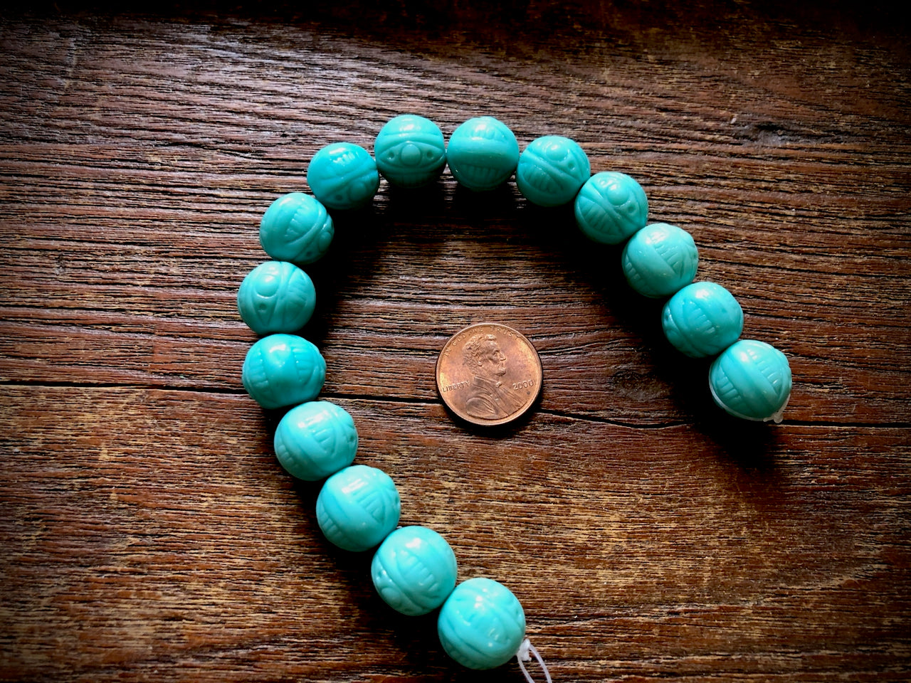Czech Glass Strand—Turquoise Polynesian Patterned Round Beads