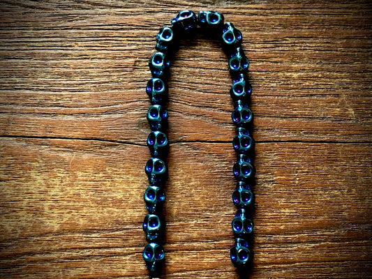 Hematite Electroplated Skulls Strand - 10mm x 8mm - 8"
