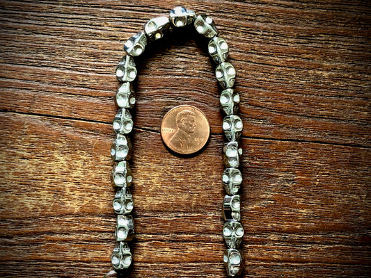 Hematite Electroplated Skulls Strand - 10mm x 8mm - 8"