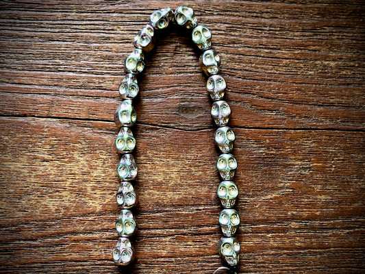 Hematite Electroplated Skulls Strand - 10mm x 8mm - 8"