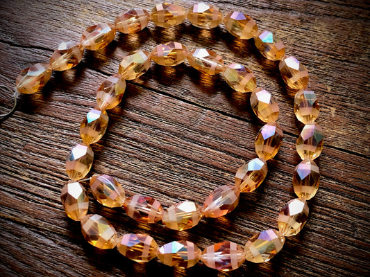 Crystal Orbits Faceted Rice Beads Strand - Peach AB - 12mm x 8mm