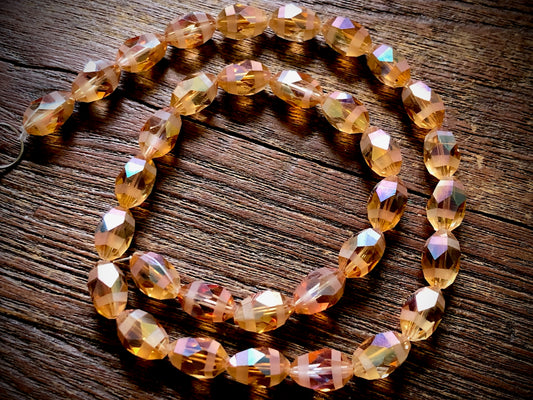 Crystal Orbits Faceted Rice Beads Strand - Peach AB - 12mm x 8mm