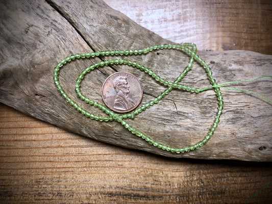 Peridot Faceted Rounds Bead Strand - 2mm - 15.5"