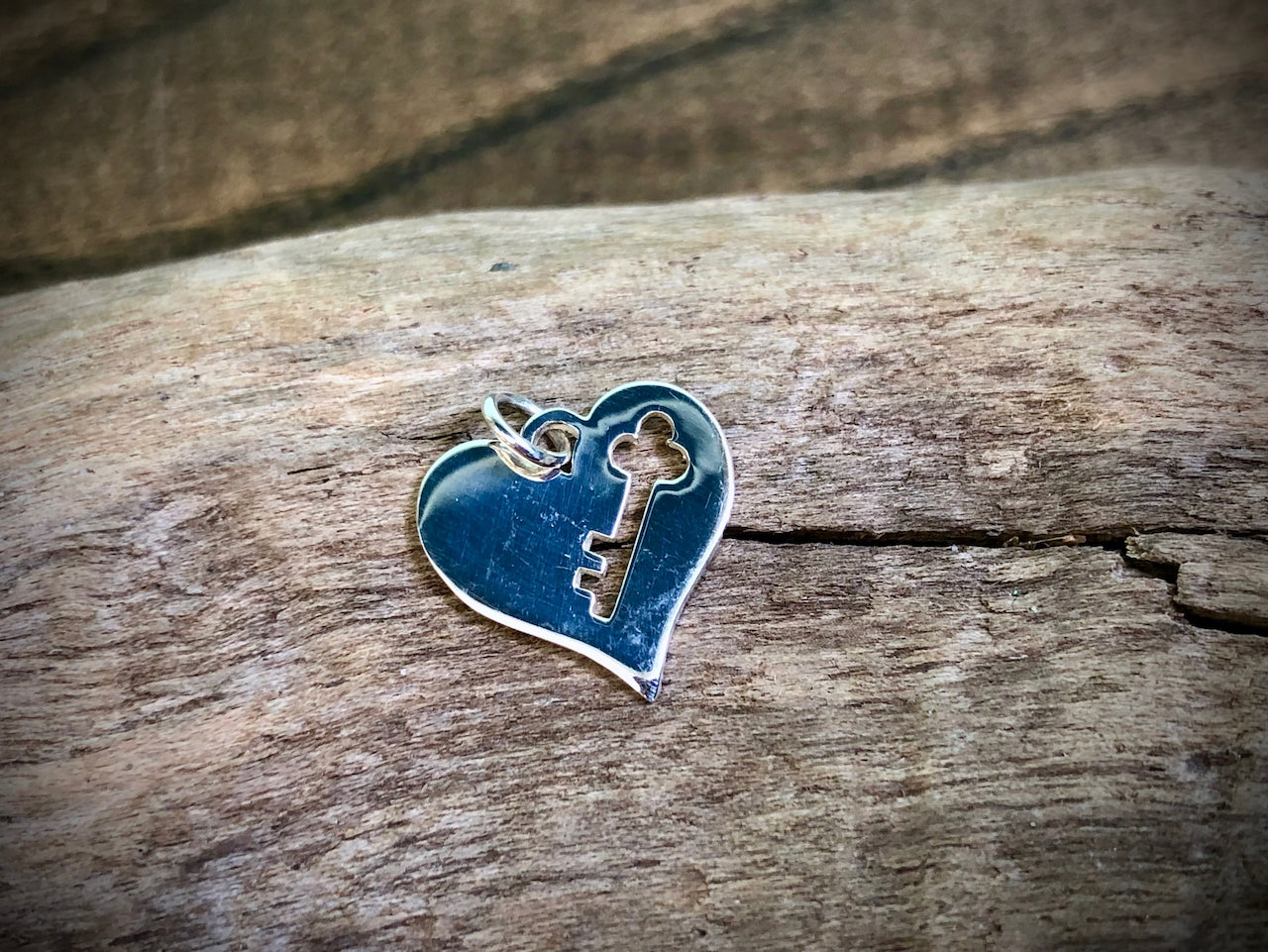 Sterling Silver Heart with Key Cutout Charm