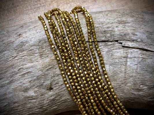 Thunder Polish Glass Faceted Rounds Strand - Yellow Gold - 2mm - 14”