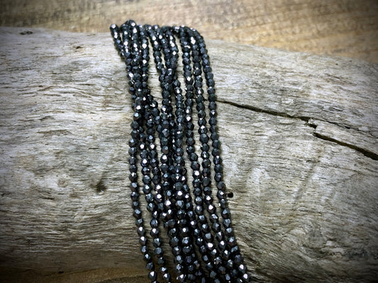 Thunder Polish Glass Faceted Rounds Strand - Hematite - 2mm - 14”