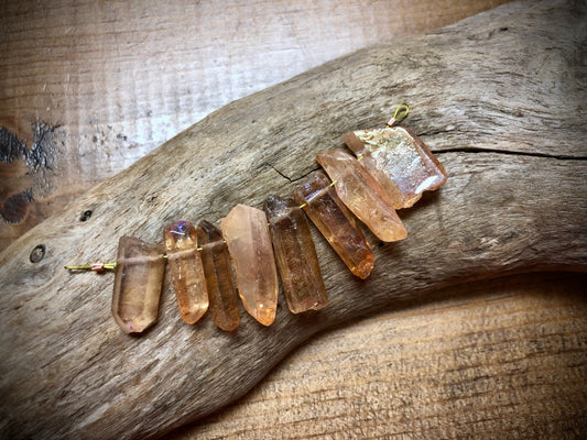 Graduated AB Bronze Coated Quartz Sticks - 27mm x 9mm to 19mm x 9mm - 2.5" Strand