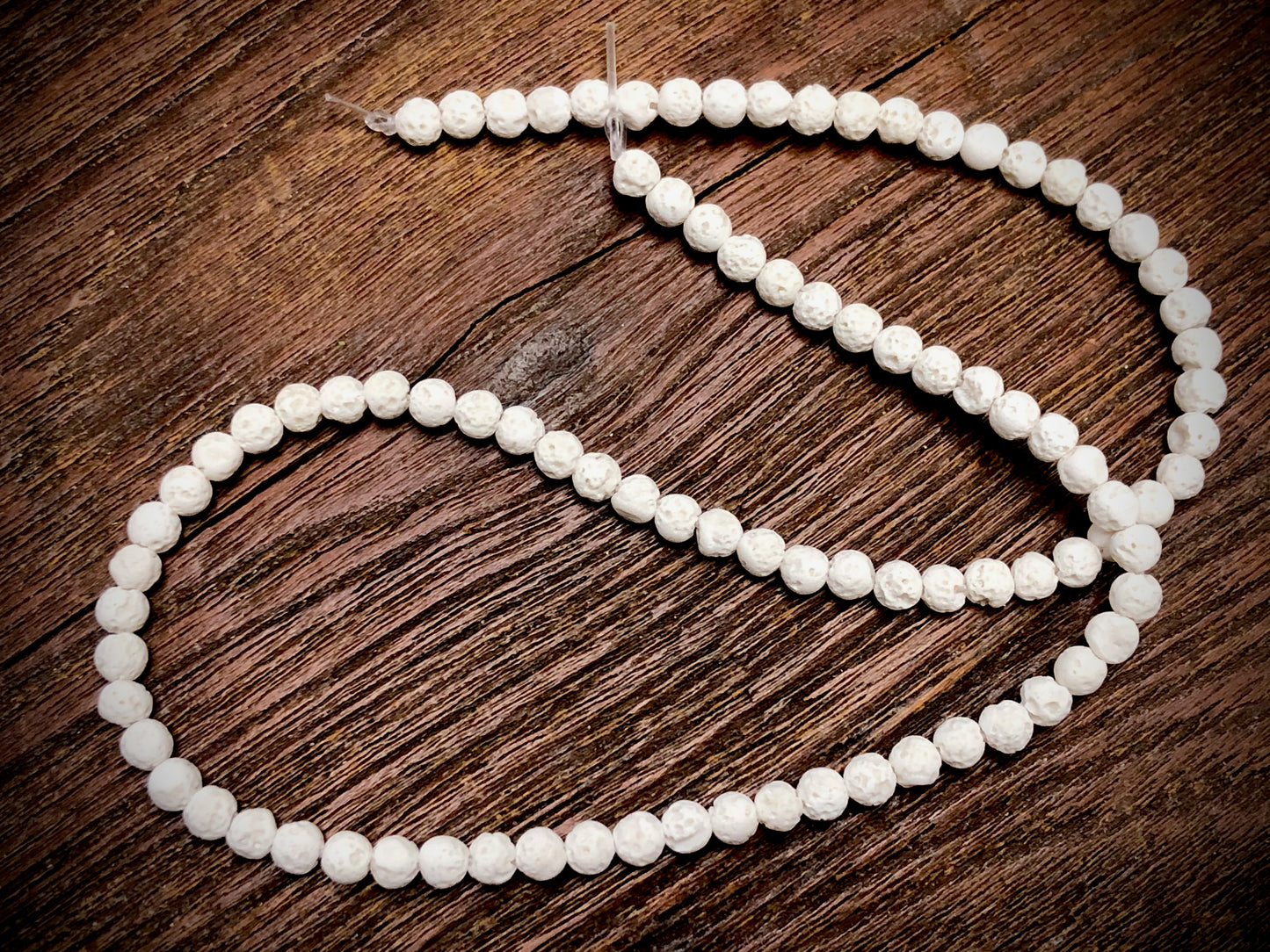 White (dyed) Lava 4-4.5mm Round Beads