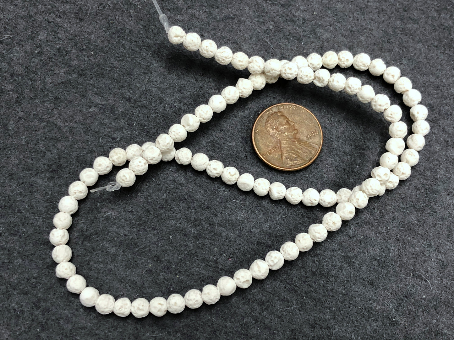 White (dyed) Lava 4-4.5mm Round Beads